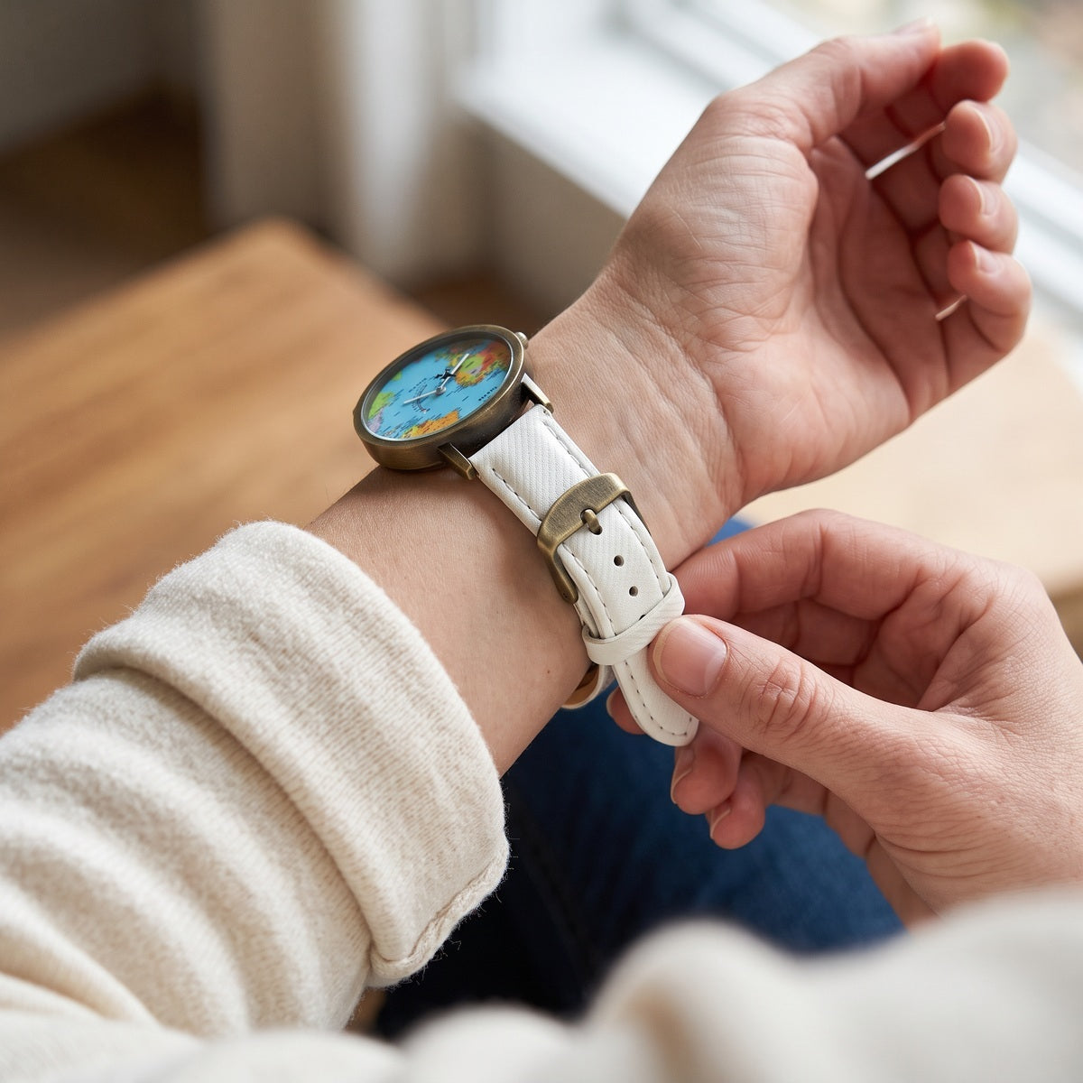 White Skybound watch showing its adjustable buckle