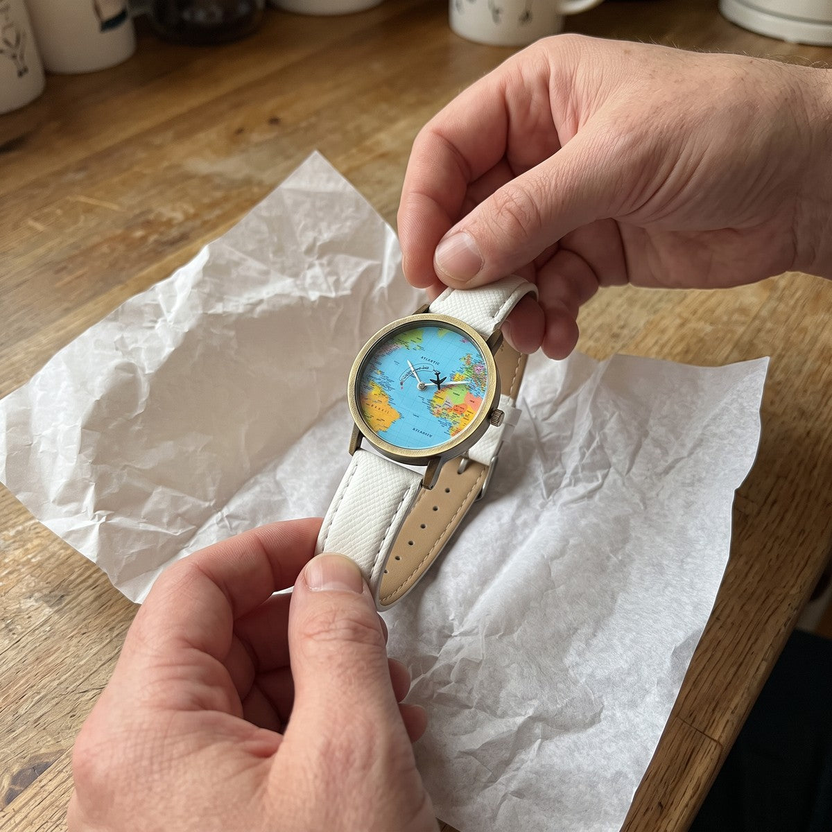 One White Skybound watch being unwrapped from tissue